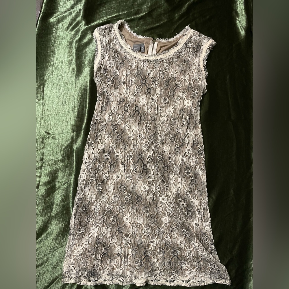 Snake print like pattern on a lace dress.